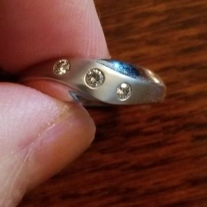 14k white gold ring with 3 tiny diamonds